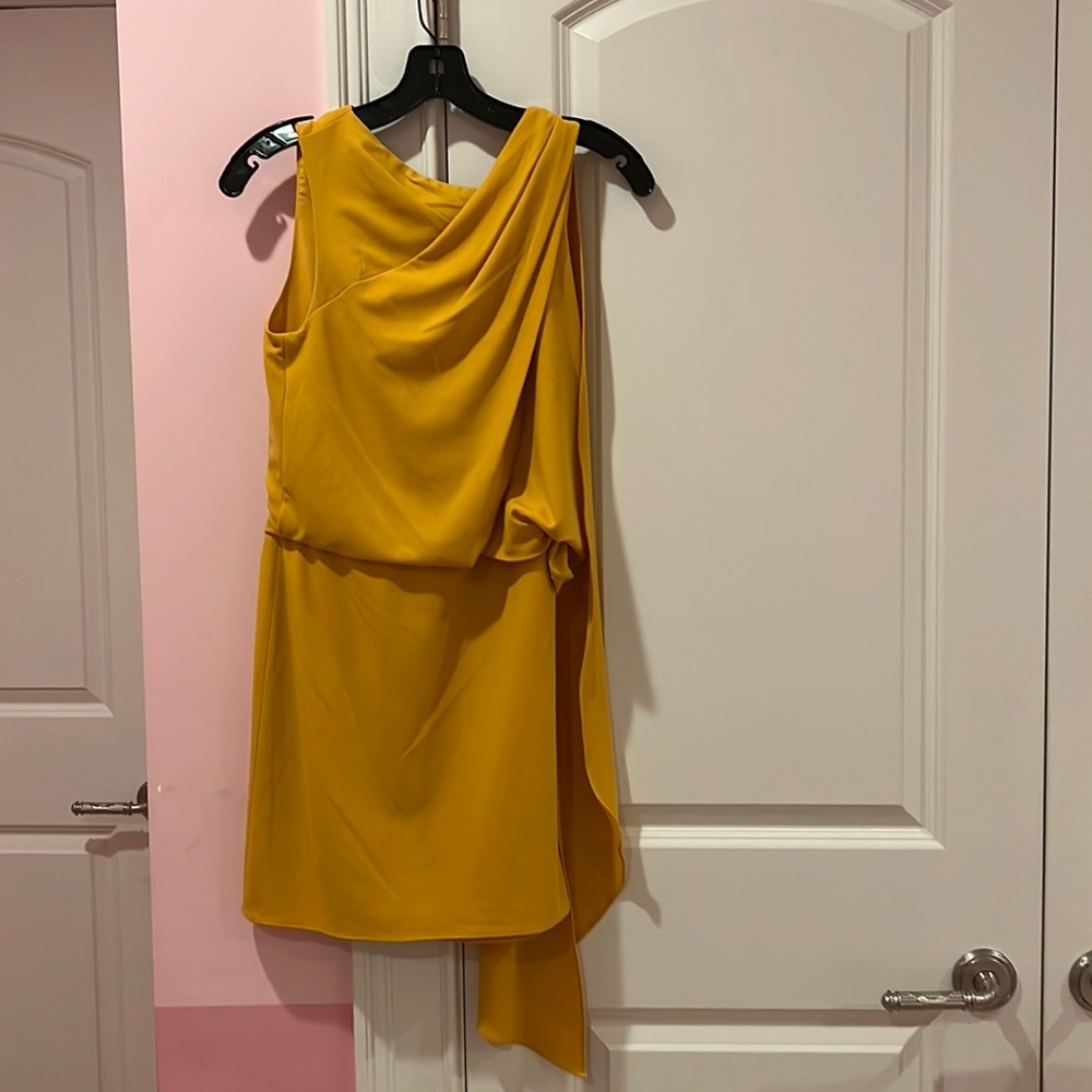 Halston mustard colored mini dress with left sleeve drape